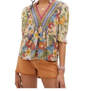 Adorable knit, printed and embroidered top.
